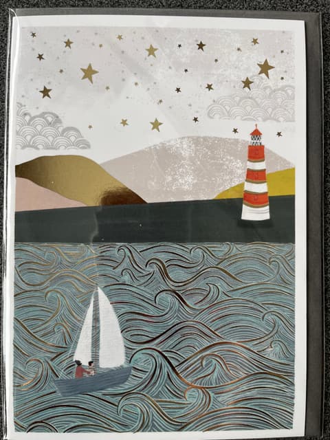 Kuku Kaart Lighthouse & Boat.